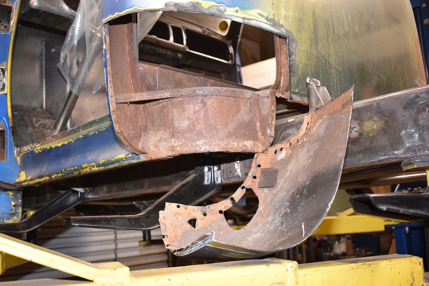 Rusty classic truck cab corner before restoration